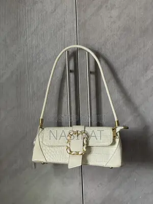 The Ultimate Y2K Aesthetic: The Off-White Croc Baguette Bag