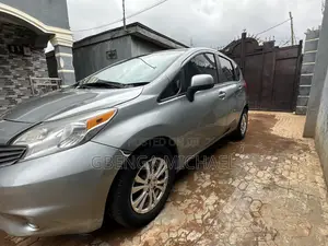 Nissan Versa 1.6 SL 4dr Sedan (1.6L 4cyl CVT) 2014 Gray