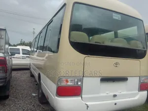 Toyota Coaster 2018 Gold