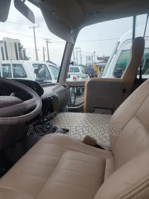 Toyota Coaster 2018 Gold