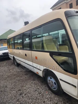 Toyota Coaster 2018 Gold
