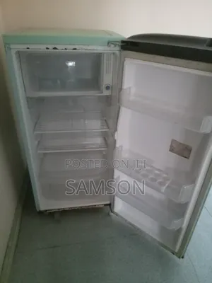 A Clean Used Refrigerator ( Not Cooling, Minor Repair Needed)