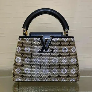 LouisVuitton Monogram Capucines
Comes in Displayed Size: Mini