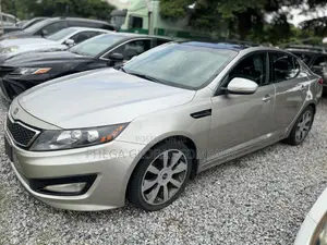 Kia Optima EX Turbo Sedan (2.0L 4cyl 6A) 2011 Gold