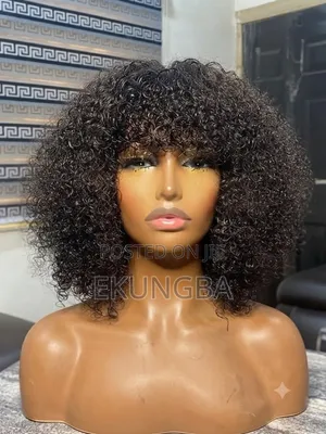 Kinky Curly Bob With Bangs.