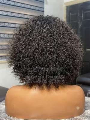 Kinky Curly Bob With Bangs.