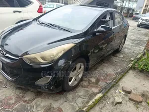 Hyundai Elantra SE Coupe FWD (1.8L 4cyl 6A) 2013 Matt Black
