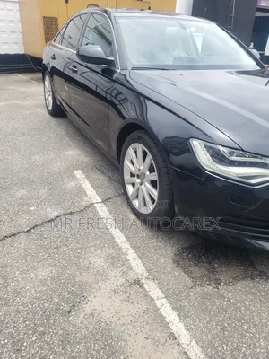 Audi A6 2.0T Premium quattro 4dr Sedan AWD (2.0L 4cyl Turbo 8A) 2014