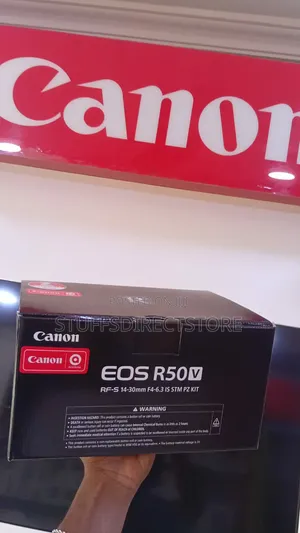 Canon EOS R50 v Mirrorless Camera With 14-30mm F/4 IS STM PZ Lens