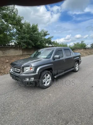 Honda Ridgeline RTL 4dr Crew Cab 4WD SB w/Leather (3.5L 6cyl 5A) 2014