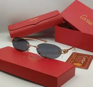 Cartier Rimless Oval Sunglasses – Gold-Tone With Grey Tinted Lenses