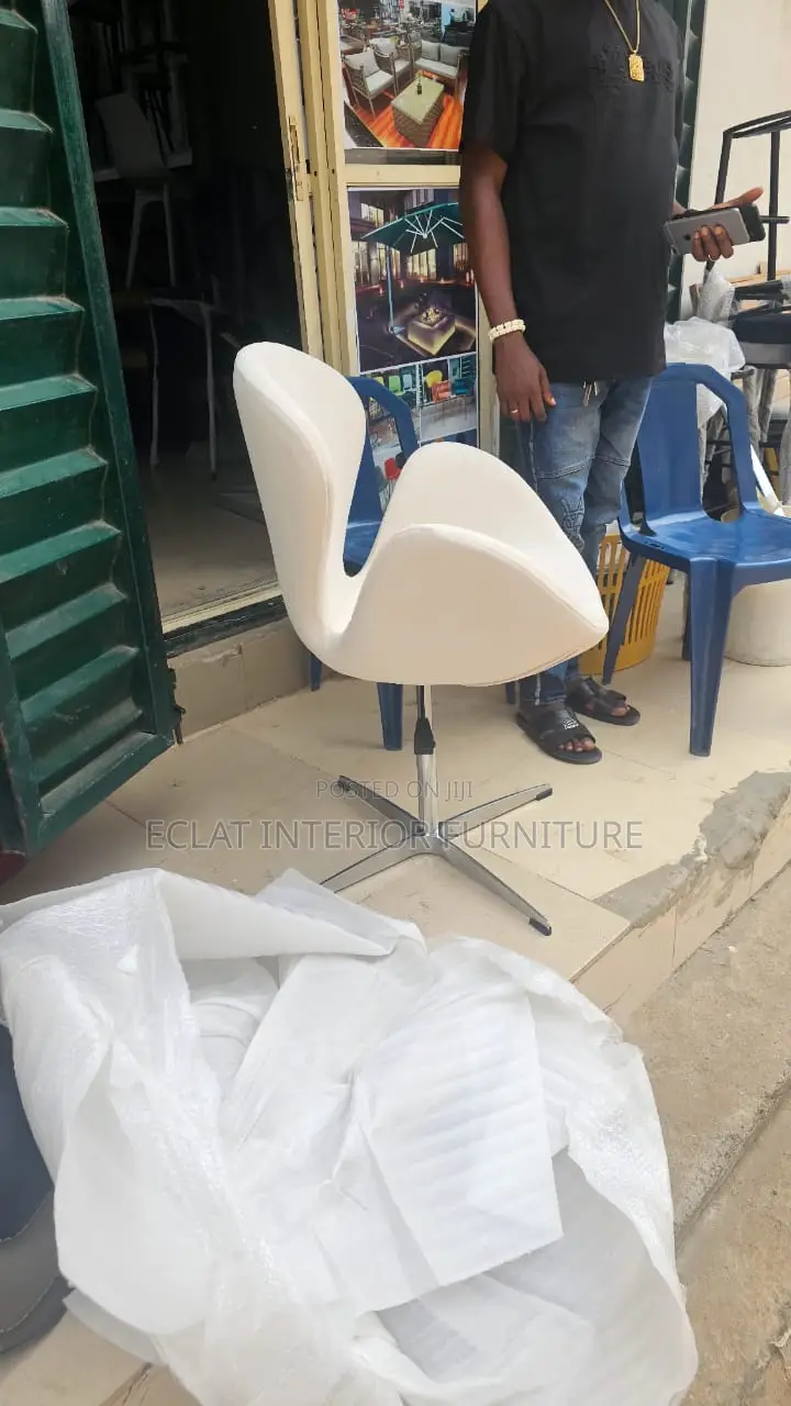 Single Swivel Arm Chair