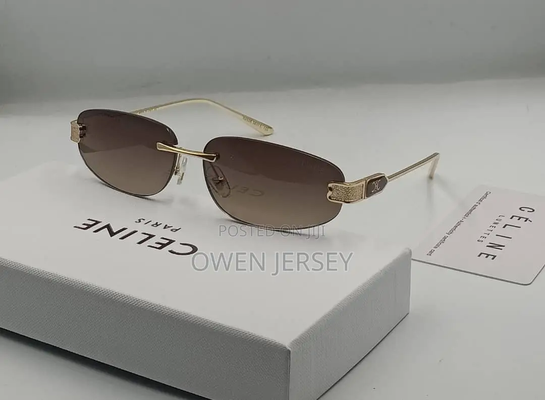 Céline Rimless Rectangular Sunglasses – Gold-Tone With Green Lenses.