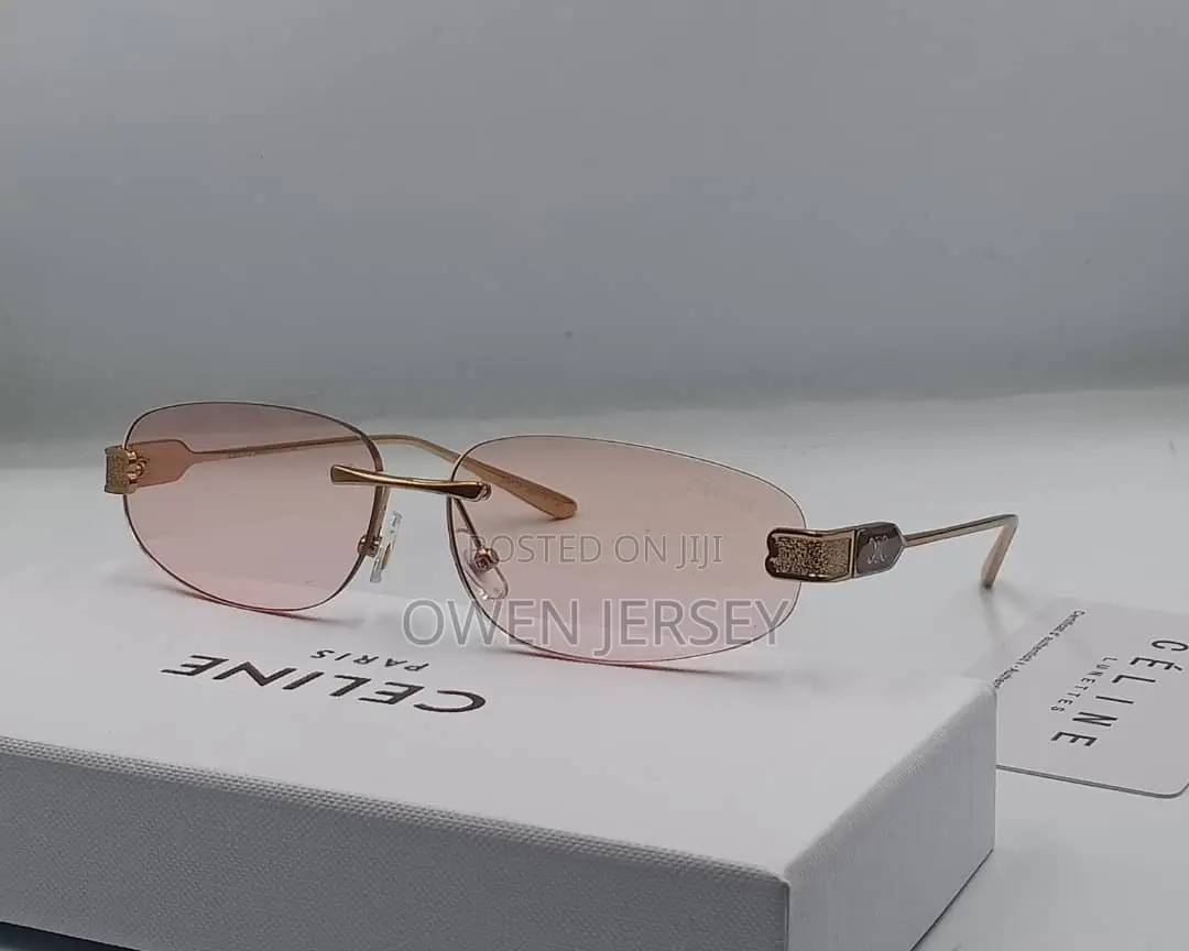 Céline Rimless Rectangular Sunglasses – Gold-Tone With Green Lenses.