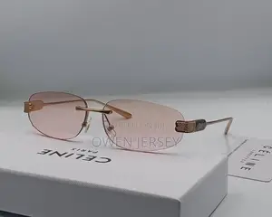 Céline Rimless Rectangular Sunglasses – Gold-Tone With Green Lenses.