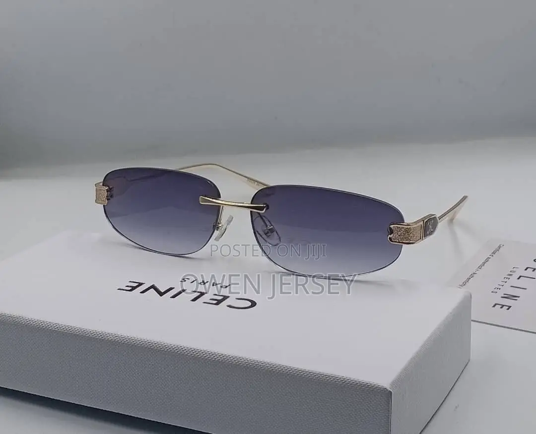 Céline Rimless Rectangular Sunglasses – Gold-Tone With Green Lenses.