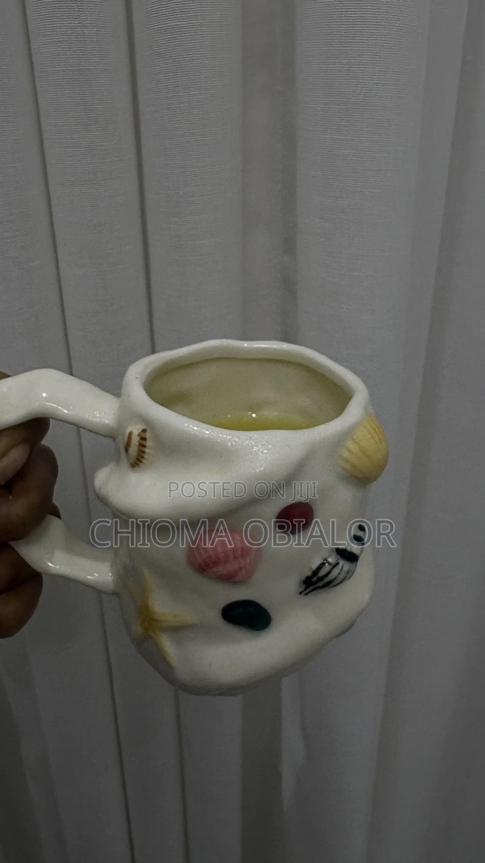 Asymmetrical White Ceramic Seashell Mug Featuring a Charming Starfish