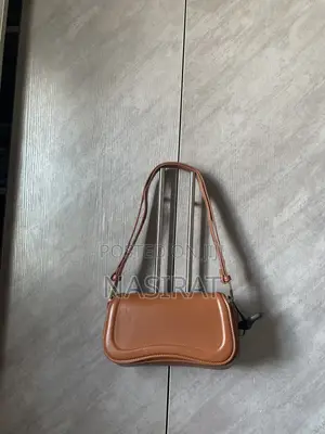 Brown JW PEI Joy Shoulder Bag.