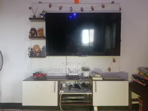 55' TCL Smart TV With Remote and TV Console