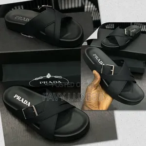 PRADA Black Criss-Cross Buckle Slide