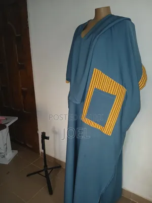 Classic Bubu Gown With Aso Oke Styled.