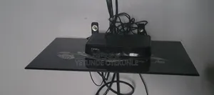 Wall-Mounted Glass Shelf for DVDs, Decoders, Remotes, Routers.