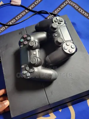PS4 With 2 Pads and 8 Games