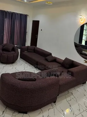 A Set of Sofas Chairs And