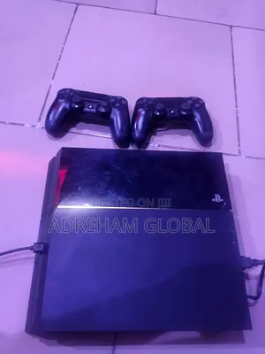 Used Ps4 With Power Cables With 2 Pads.. Installed Games