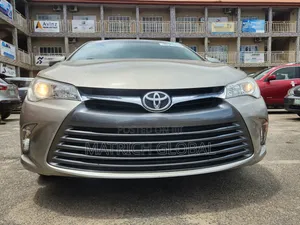 Toyota Camry LE 4dr Sedan (2.5L 4cyl 6A) 2015 Gold