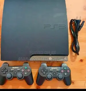 Fairly Used Ps3 Slim With Two Pads and 7 Games