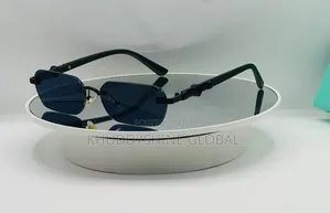 Black Rimless Rectangular Sunglasses Featuring Dark Tinted Lenses