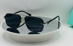 Black Rimless Rectangular Sunglasses Featuring Dark Tinted Lenses