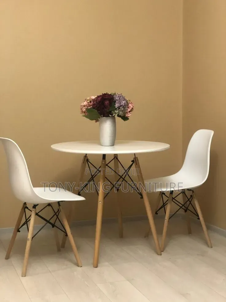 Modern White Round Dining Table Set With Two Molded Fiber Eames Chairs