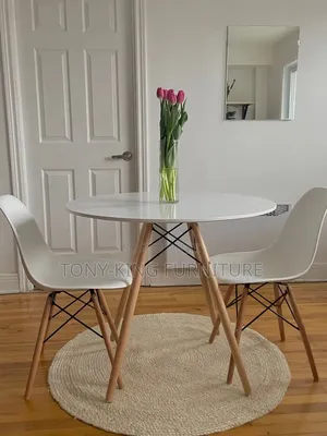 Modern White Round Dining Table Set With Two Molded Fiber Eames Chairs