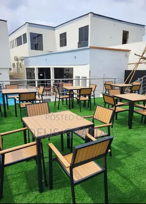 Outdoor Table With Wooden Top and Metal Base
