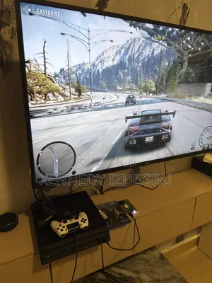 Neatly Used Ps4 Pro, With Accessories