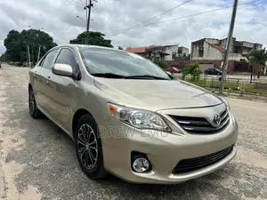 Toyota Corolla LE 4dr Sedan (1.8L 4 cyl 4A) 2009 Gold