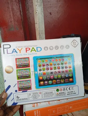 Children Play Pad & Study the Machine