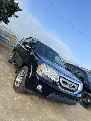 Honda Pilot Touring w/RES/Navi 4WD (3.5L 6cyl 5A) 2013 Black