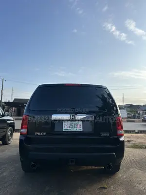 Honda Pilot Touring w/RES/Navi 4WD (3.5L 6cyl 5A) 2013 Black