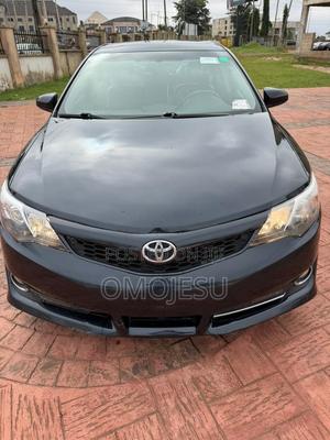 Toyota Camry SE Sport 4dr Sedan w/Prod. End 11/13 (2.5L 4cyl 6A) 2014