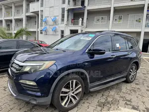 Honda Pilot Touring 4dr SUV 4WD (3.5L 6cyl 9A) 2017 Blue