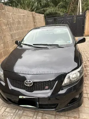 Toyota Corolla Base 4dr Sedan (1.8L 4cyl 5M) 2010 Black