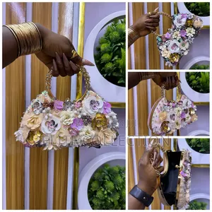 Trendy Floral Purse Gold, Pink and Black Color
Boxed
