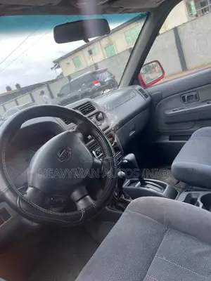Nissan Frontier SE-V6 4x4 King Cab 116.1 in. WB 2002 Red