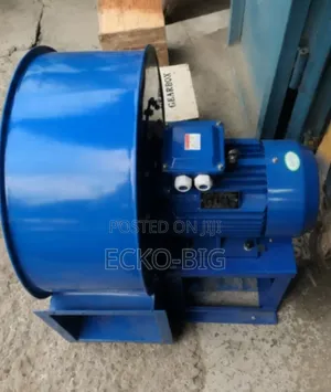 Blue Industrial Centrifugal Fan Blower With a Red Intake Nozzle.