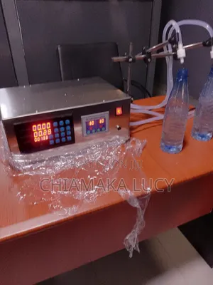 Double Head Digital Liquid Filling Machine