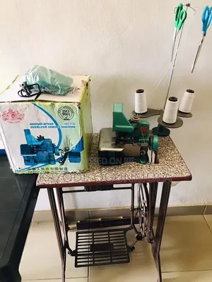 Two Lion Overlook Weaving Industrial Sewing Machine.