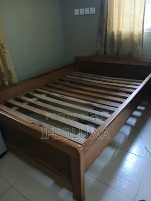 A Wooden 4 by 6 Bedframe
